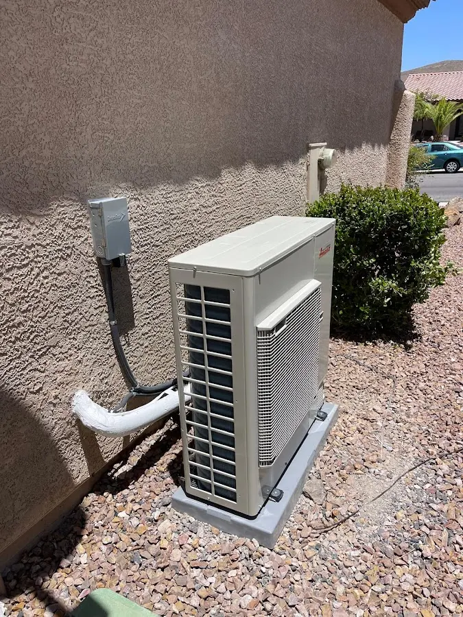 Residential air conditioning condenser unit in Atchison